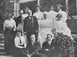 In a large house, the butler (centre-left) is traditionally head over a full array of household servants. This is the servant staff at the Stonehouse Hill of Massachusetts, the estate of Frederick Lothrop Ames, 1914. Amesservants.jpg