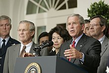 President Bush stands with Secretary of Defense Donald Rumsfeld, Secretary of Labor Elaine Chao and Secretary of Health and Human Services Mike Leavitt during a press conference from the Rose Garden, regarding the devastation along the Gulf Coast caused by Katrina. BUSHKATRINA.jpg