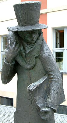 Statue of "E. T. A. Hoffmann and his cat" in Bamberg (Source: Wikimedia)