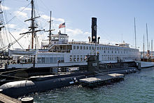 Dolphin berthed next to Berkeley at the San Diego Maritime Museum Berkeley Ferry and U.S.S. Dolphin at the Maritime Museum of San Diego.jpg