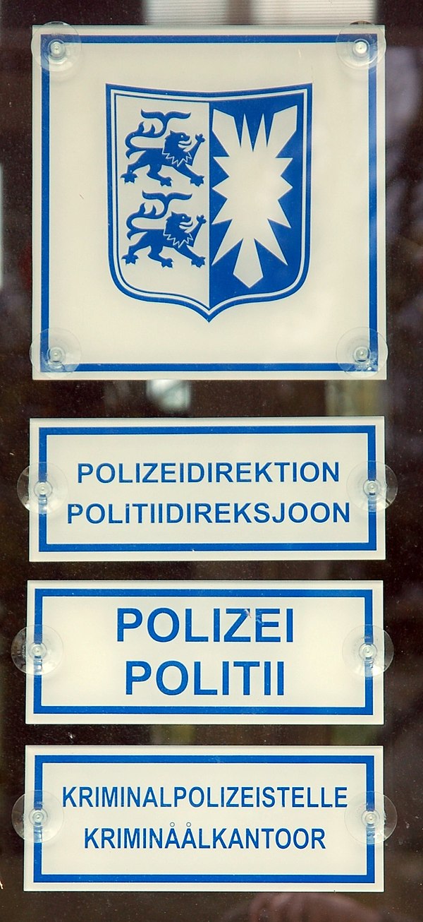 Bilingual sign in German and North Frisian, respectively, in Husum, Germany