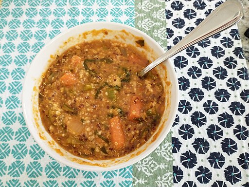 Bowl of lentil soup with green and red lentils