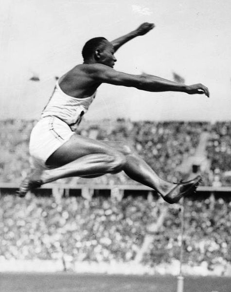 Owens displaying excellent form during his victory in the long jump at the 1936 Summer Olympics in Berlin