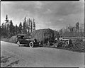 Car near tractor with load of hay, 1921 (MOHAI 1362).jpg