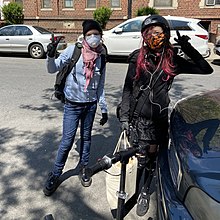 Manning (left) in Brooklyn during the coronavirus pandemic in April 2020, forty days after her release from jail Chelsea Manning on 21 April 2020.jpg
