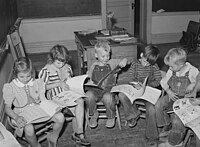 Children looking at picture books at school, Santa Clara, Utah