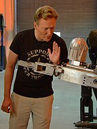 Conan O'Brien talking to a bomb defusing robot