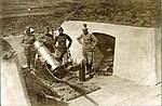 Serbian troops with a captured Ottoman 21 cm mortar during the 1st Balkan War.