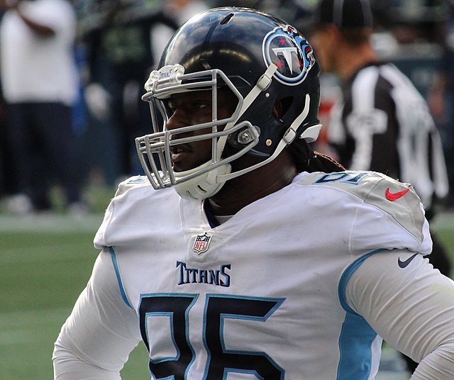 Tennessee Titans defensive end Denico Autry (96) stands on the sideline  during an NFL football game against the Buffalo Bills, Monday, Sept. 19,  2022, in Orchard Park, N.Y. (AP Photo/Kirk Irwin Stock