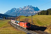 37. KW Der EC 163 „Transalpin“ der Salzburg-Tiroler-Bahn bei Fieberbrunn (Dezember 2016).