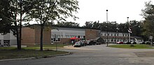 Ecole Rose-des-Vents in 2009. The school is operated by Conseil scolaire acadien provincial, a French-language school board established in 1996. EcoleRoseDesVents GreenwoodNS.jpg