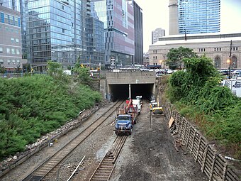 The West Side Line in Midtown Manhattan, seen in 2013. This opening was permanently covered by residential construction later that year. Empire Connection fr 61 St jeh.jpg