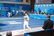 Deutsch: Fechten bei den Olympischen Jugend-Sommerspielen 2018: Tag 1, 7. Oktober 2018, Jungen, Säbel, Viertelfinale - Hibiki Kato (JPN) - Hyun Jun (KOR) 12:15 English: Fencing at the 2018 Summer Youth Olympics at 7 October 2018 – Boys' sabre Quarterfinals – Hibiki Kato (JPN) Vs Hyun Jun (KOR) 12:15