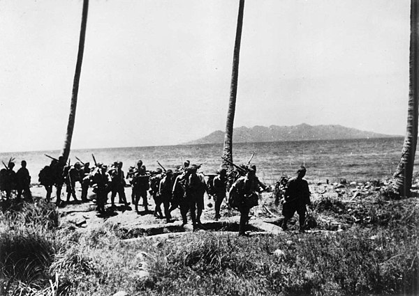 Japanese reinforcements arriving on Guadalcanal, circa early September 1942; note Savo Island in background.