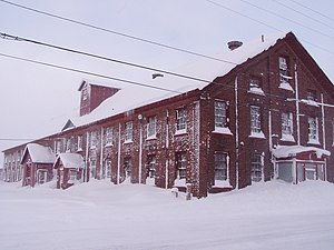 Warehouse of the Calumet and Hecla Mining Company in Calumet, Michigan. H n C Mining Company Warehouse Calumet, MI.JPG