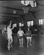 A basketball game between the Heart Mountain and Powell High School girls teams, Wyoming, March 1944 Heart Mountain Relocation Center, Heart Mountain, Wyoming. A hotly contested interscholastic basket . . . - NARA - 539726.jpg