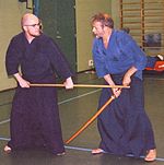 Japanese Martial art called Jodo – technique: Kuri tsuke.