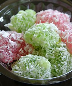 Khanom tom, glutinous rice powder, coconut cream, grated coconut, sugar and flavourings