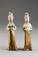 Earthenware figures of female attendants, with coloured lead glazes, Tang dynasty, early 8th century.