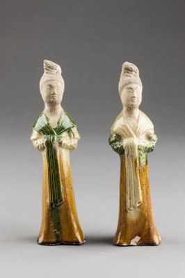 Earthenware figures of female attendants, with coloured lead glazes, Tang dynasty, early 8th century.
