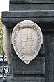 English: Lithic coat of arms for baron Ludwig von Grottau at the north side of the Lindwurm fountain`s base Deutsch: Steinernes Wappen für den Verordneten und Freiherrn Ludwig von Grottau an der Nordseite des Lindwurmbrunnens