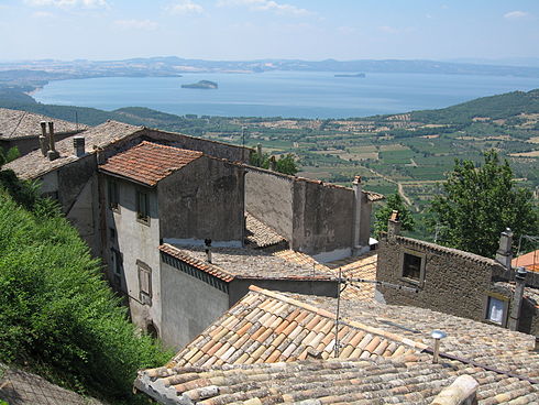 The southernmost end of the lake viewed from the ridge of Montefiascone caldera. Martana is on the left and Bisentino on the right. The straight shore to the far left is Marta. To the left of Martana is the headland of Capodimonte.