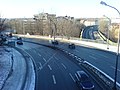 Die beiden Äste der Candidstraße, im Vordergrund ein Teil der den Hang hinaufführenden S-Schleife, dahinter die in den Candidtunnel führende Hochstraße