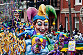 Doubloons are thrown from Mardi Gras floats such as this one