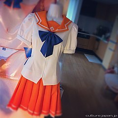 File:Mirai Suenaga with summer school uniform and K-on character style  20110305.jpg - Wikimedia Commons