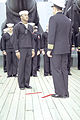 Capt Moosally presents an award to an Iowa crewmember for his distinctive service during the disaster.