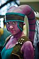 "NYCC_2011_-_Twi'lek_(6311282522).jpg" by User:AdamBMorgan