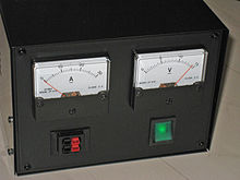 A simple general-purpose desktop power supply used in electronic labs, with power output connector seen at lower-left and power input connector (not shown) located at the rear Netzgeraet.jpg