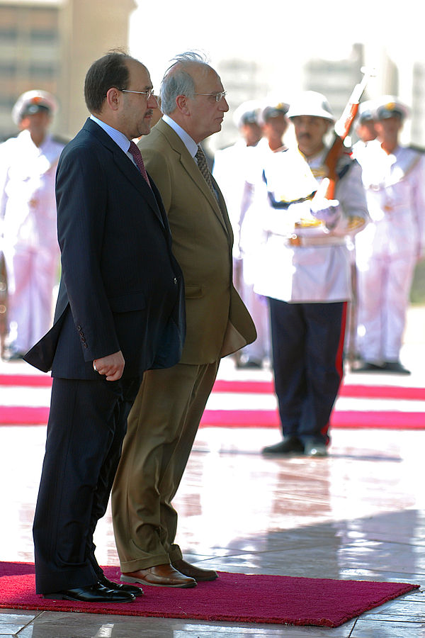 The celebration ceremony of Iraq's national sovereignty was attended by Iraq's prime minister, Nouri al-Maliki, left, and the Minister of Defense, Abd