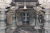 Open mantapa with bay ceiling supported by lathe turned pillars made of soap stone facing the sanctum in the Siddheshvara temple at Haveri Open mantapa facing sanctum in the Siddhesvara temple at Haveri.jpg
