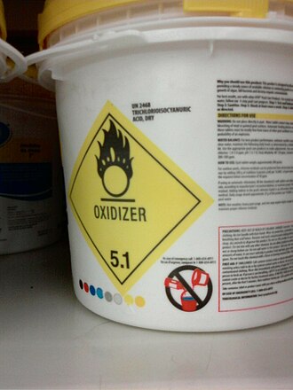 HAZMAT 5.1 placard on a pail of UN 2468,Trichloroisocyanuric acid for use in swimming pools. Oxidizer 5.1 hazmat logo.jpg