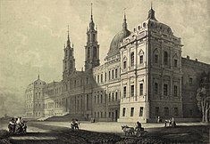 The massive façade of the Mafra Palace dwarfing the country-folk that lived in its shadow