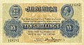 A Treasury of Jamaica 10 shillinges (1/2 font sterling) címletének előoldala V. György király portréjával