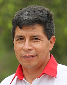 Headshot of Castillo facing left against a natural background