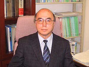 Photo of Professor Tohru Eguchi in his office.jpg