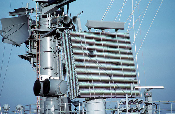 An SPS-48E radar antenna (the large square panel) aboard USS Theodore Roosevelt (CVN-71).