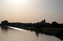 Ely cathedral with the River Great Ouse in the foreground; though most of the Fenland was drained in the early modern period and Ely is no longer an island, the landscape retains some watery features River Great Ouse & Ely Cathedral.jpg