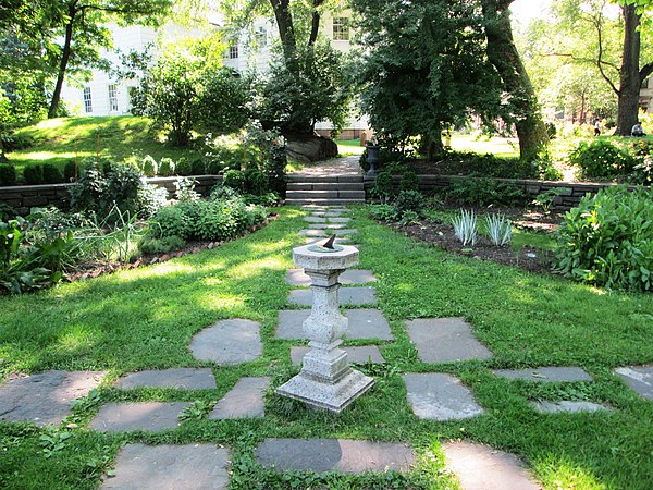 The garden in Roger Morris Park, which serves as the grounds for the mansion, as seen in 2014