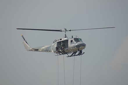 Royal Thai Air Force special operation troops rappel from UH-1 during a demonstration on Children day 2013