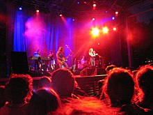The Cardigans performing in June 2004. The Cardigans.jpg