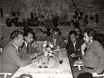 Guevara speaking with Tito during a visit to Yugoslavia