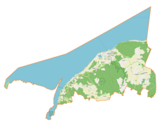 Mapa konturowa gminy Tolkmicko, blisko centrum na dole znajduje się punkt z opisem „miejsce bitwy”