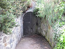 The entrance to the Prince of Wales magazine underneath Princes Park in 2010 Tunnel to Prince of Wales Battery magazine.JPG