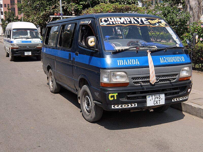 File:Two dala dalas (minibuses) in Mwanza.JPG