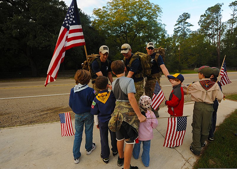 File:U.S. Air Force Staff Sgt. Danny Wright, Senior Airman Jordan Delbohm and Airman 1st Class Keith Thompson greet members of Cub Scout Pack 221 during the Tim Davis Memorial March in Madisonville, La., Oct. 23 111023-F-PV498-050.jpg