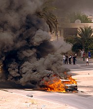 An Iraqi vehicle burns in Baghdad after being hit by a mortar that was fired by insurgents, 8 August 2006 US Navy 060808-N-7590D-035 An Iraqi vehicle burns in Baghdad after being hit by a mortar that was fired by insurgents.jpg